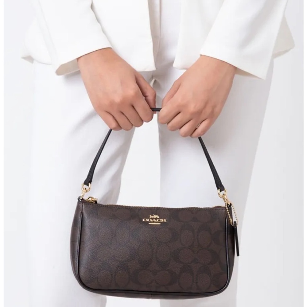 COACH TOP HANDLE POUCH IN SIGNATURE